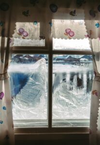 Decorative winter window Image of a sad winter window showing the view of someone with Winter Depression in Madison WI.