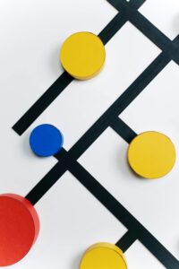Abstract relationship diagram with connected circles, representing family systems, support networks, and the interconnected patterns explored through genogram therapy.