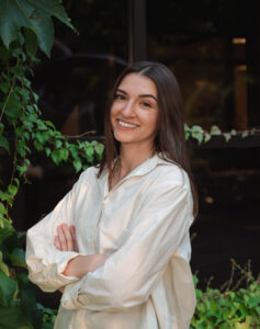 Headshot of Abby, a client-centered therapist specializing in perinatal mental health, women’s issues, trauma, anxiety, grief, and substance use.