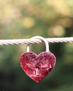 Heart-shaped lock symbolizing trust, vulnerability, emotional safety, and meaningful relationships.
