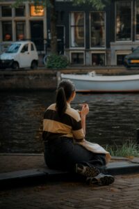 Woman taking a quiet moment for herself, representing Therapy for Mental Load and compassionate women's mental health care.