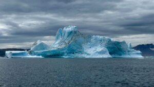 Iceberg rising above ocean water, symbolizing hidden emotional abuse and coercive control addressed in relationship trauma therapy in Madison.